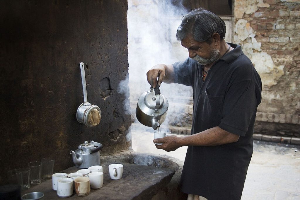 Steaming hot chai being poured in India, one of the best countries for food and drink