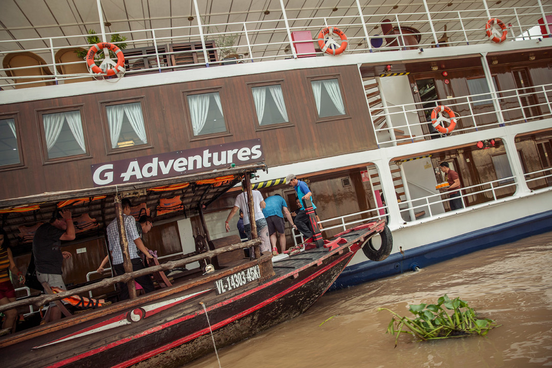 Travellers boarding a river cruise in Vietnam