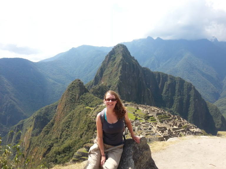 Claire , left smiling after reaching Machu Picchu