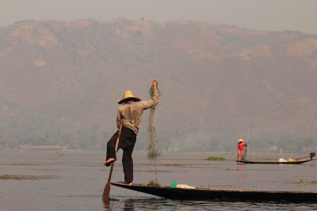 Myanmar man paddling at Lake Inle