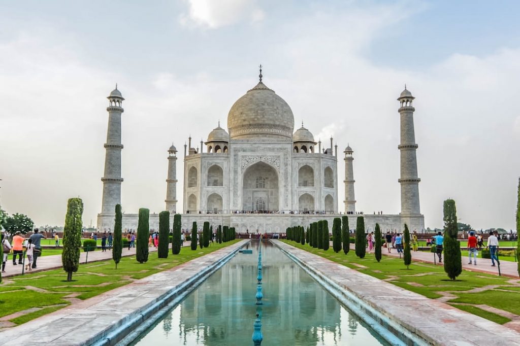 The Taj Mahal is The ivory-white marble mausoleum of Taj Mahal on the south bank of the Yamuna river in the Indian city of Agra.