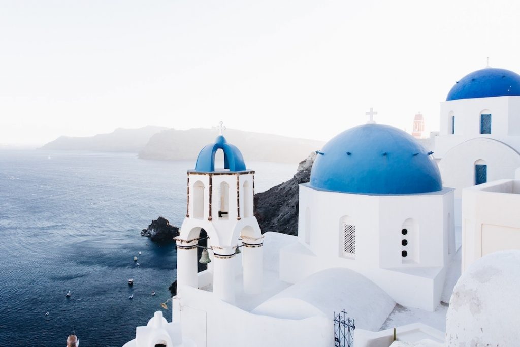 Blue-domed white building - Summer in Greece