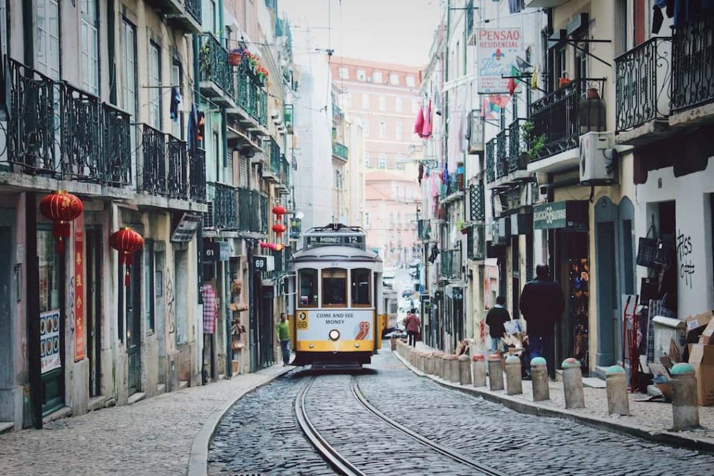 A yellow tram in Lisbon, Portugal