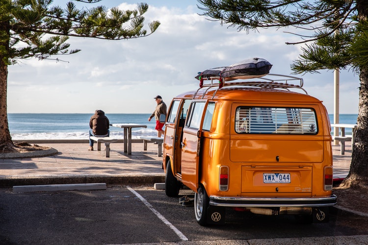 Orange VW Kombi on Manly Beach in Austrailia