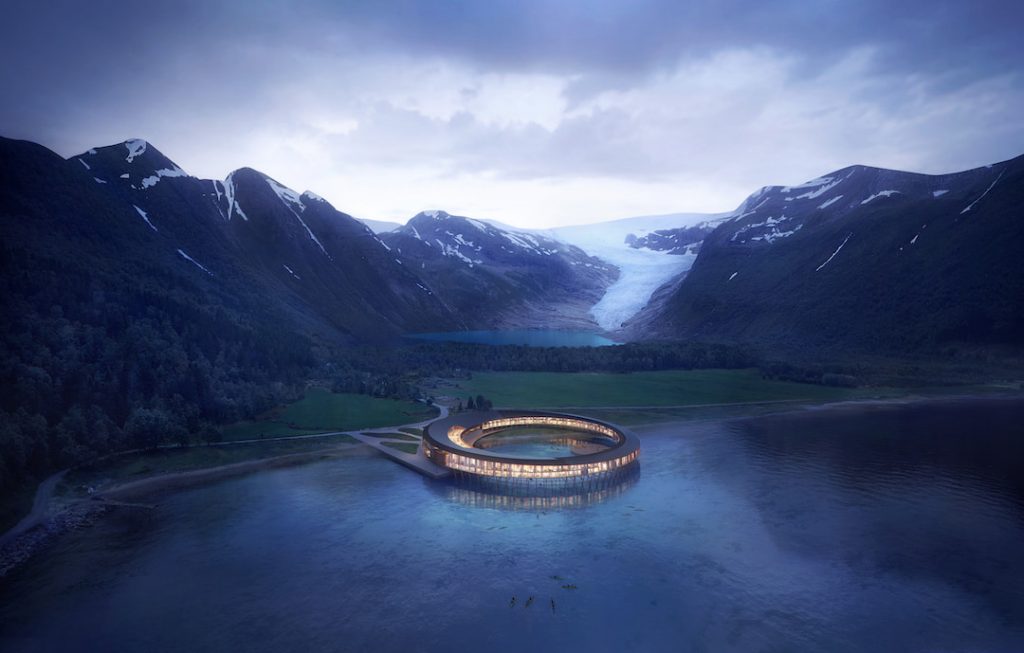 A space ship like hotel sits between Arctic Waters, a fjord and a glacier in Norway