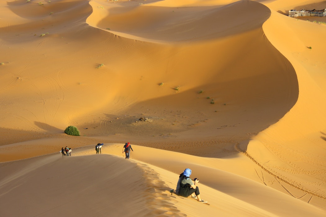 Desert Hiking Essentials: A group of hikers in the Sahara Desert