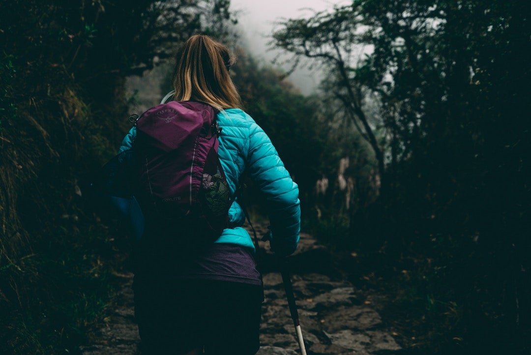 The back of a woman hiking the Inca Trail, Peru