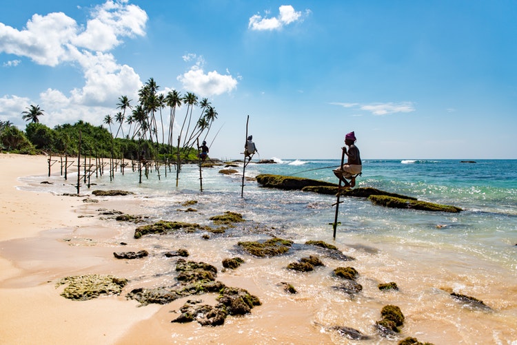 Local sets up stands on Mirissa Beach, Mirissa, Sri Lanka