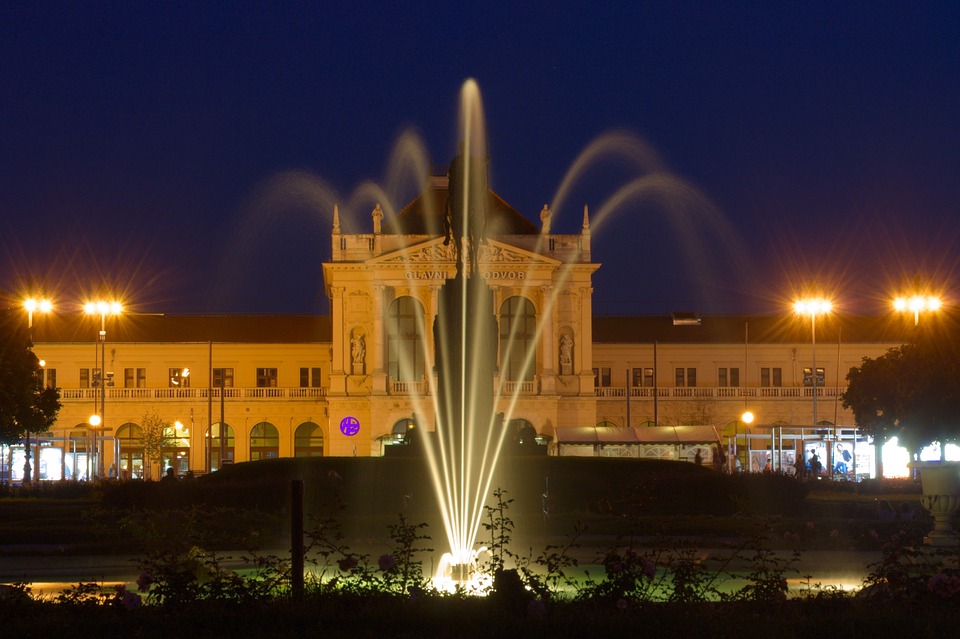 Zagreb fountain in front of the old railway station at night
