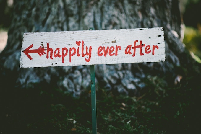A painted sign that says happily ever after