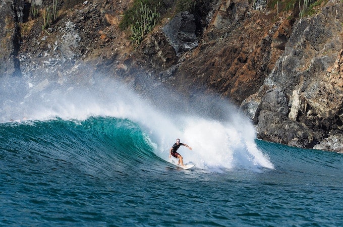 A man surfing in costa rica