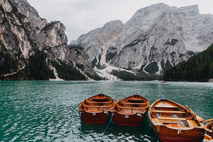 Three boats on a lake in Italy