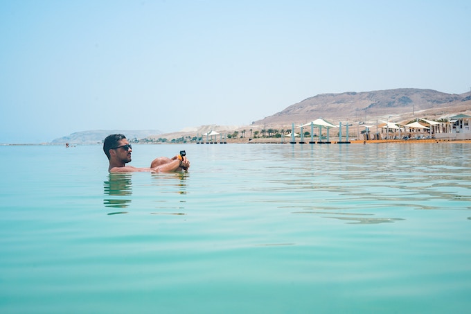 A man floating in the dead sea, israel