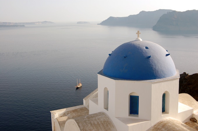 Blue domed building in Oia, Greece