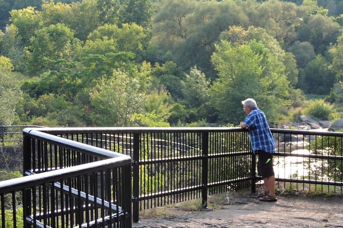 A man standing on an overlook