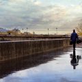 man walking beside the street