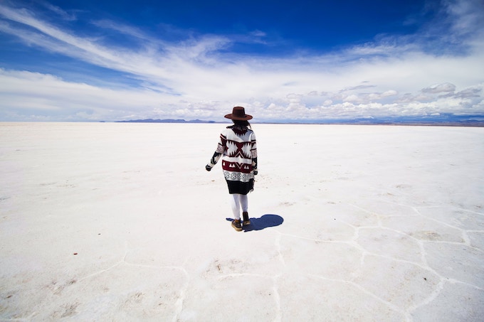 A woman standing on the Bolivian Salt Flats