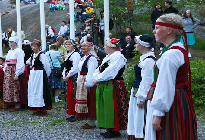 A group of Finnish women in traditional dress during Midsummer celebrations