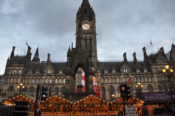 A christmas market outside Town Hall, Manchester, UK