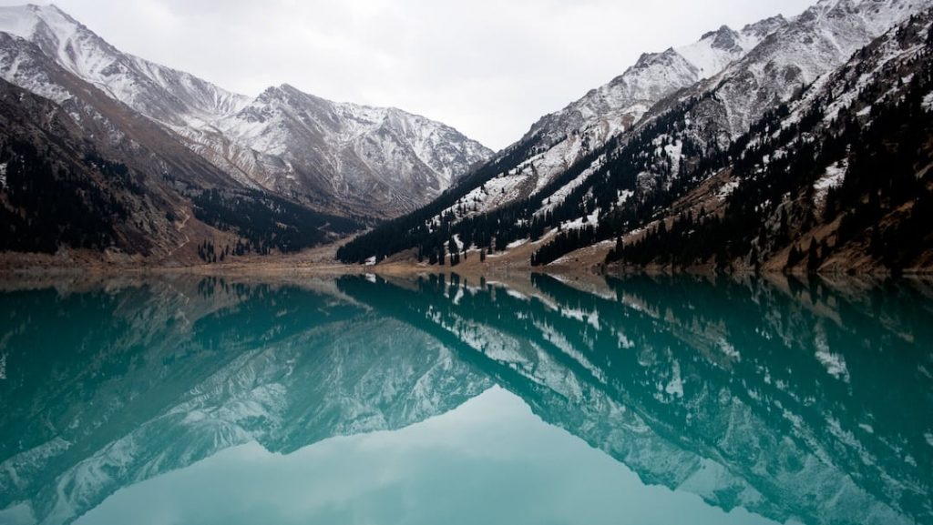 Mountains and a turquoise lake near Almaty, Kazakhstan