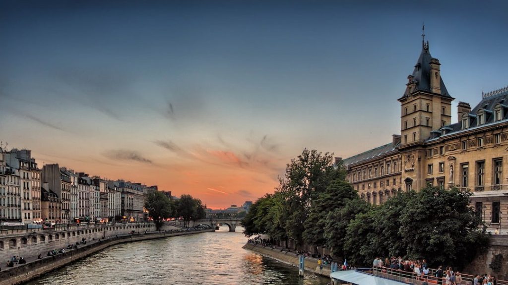 Buildings along the Seine River in Paris at sunset