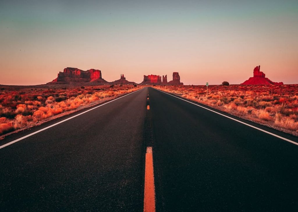 Empty road surrounded by desert in Utah