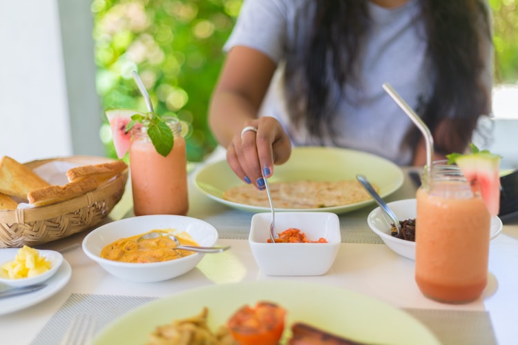 girl eating breakfast