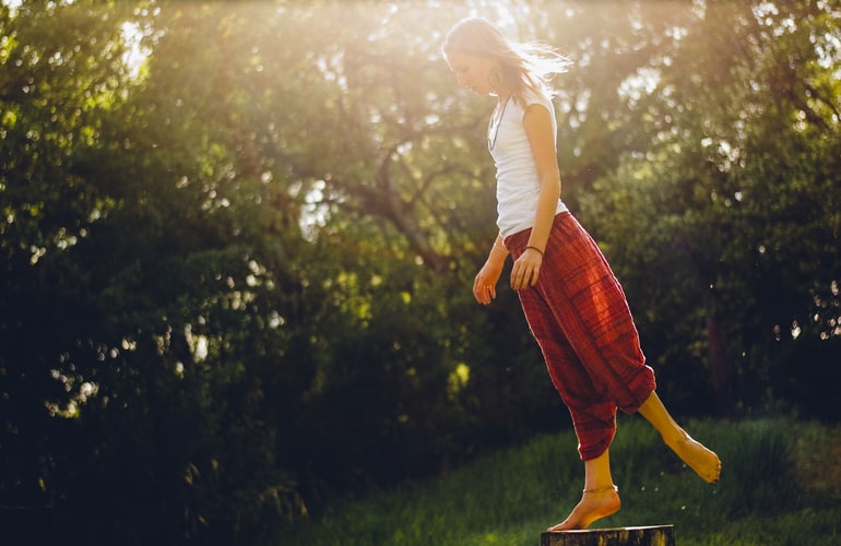 a woman on tiptoes