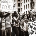 Group of people holding signs at Black Lives Matter protest