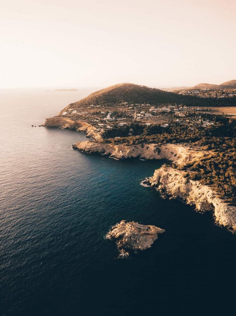 Coastline and pine-covered hills in Ibiza, Spain