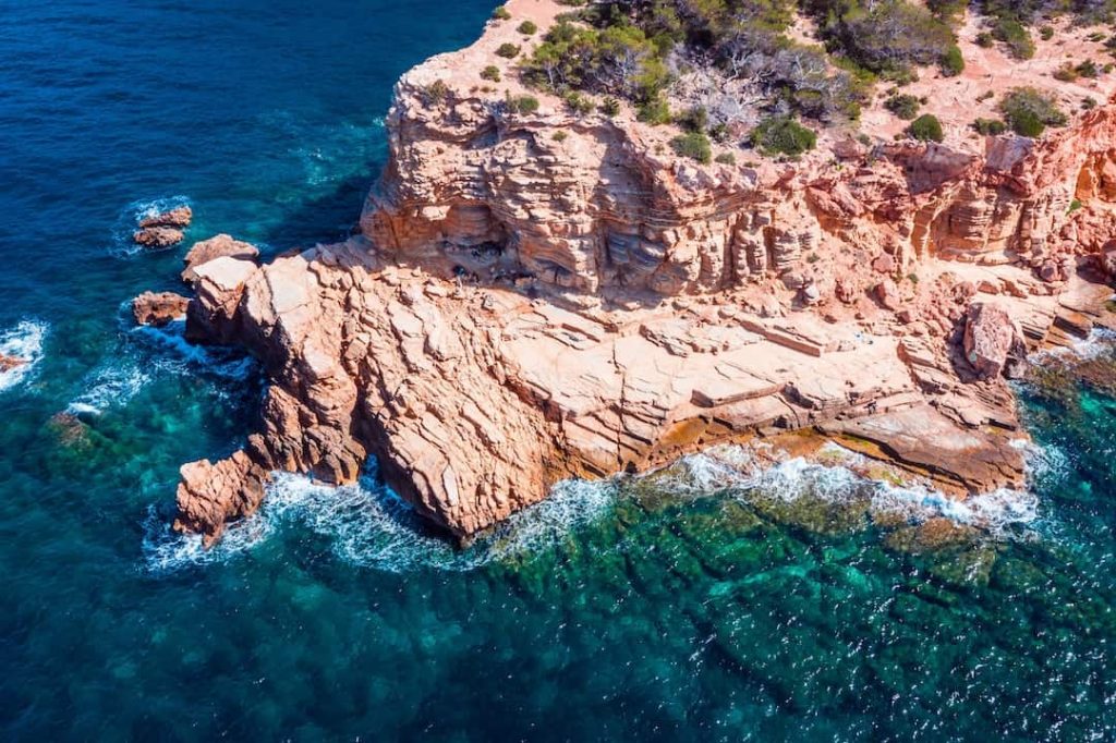Rock formations and sea at Punta Galera, Ibiza, Spain