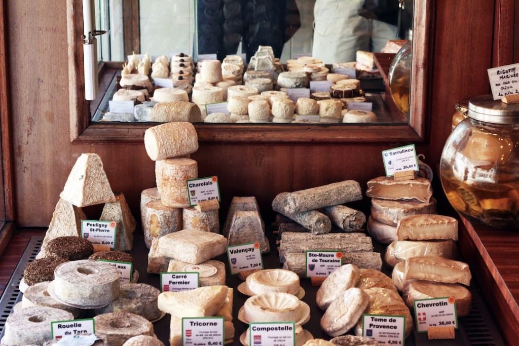 Cheese display from around France in a shop